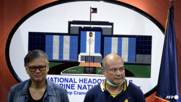 Philippine ex-governor accused of activist's killing surrenders