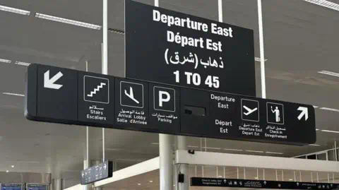 EPA A departure sign at Beirut-Rafik Hariri International Airport, 3 October